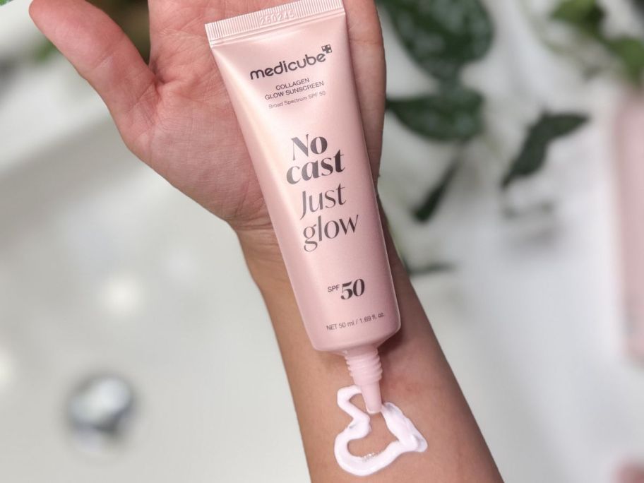 A tube of medicube Sunscreen No Cast Just Glow Collagen SPF 50