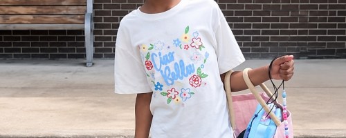 little girl in a graphic tee