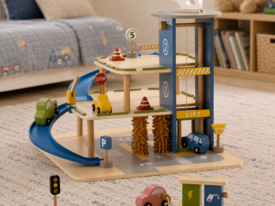 wooden parking garage playset in a child's bedroom