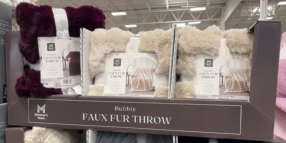 maroon, and tan bubble blankets on display 