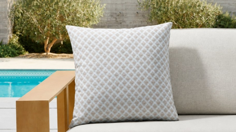 block print pillow on an outdoor sofa