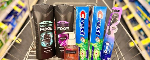 2 axe body washes, a neutrogena facial cleanser 2 crest toothpastes and an oral-b toothbrush in a shopping cart