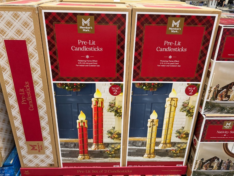 red and white outdoor decor candles in box