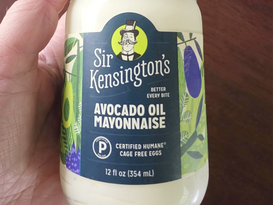 hand holding jar of sir kensington mayo
