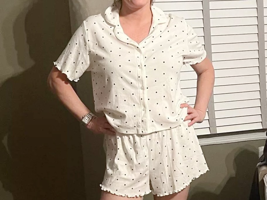 woman wearing white polka dot pajamas