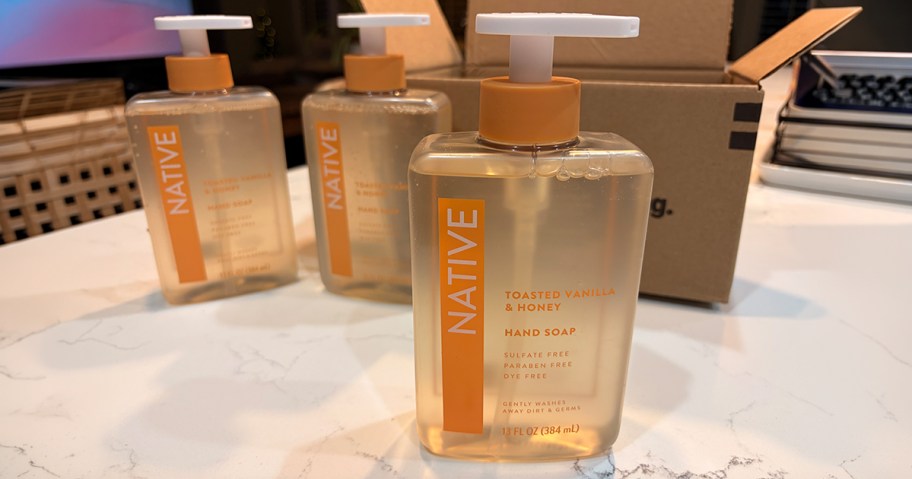 three Bottles of Native Soap in front of a box