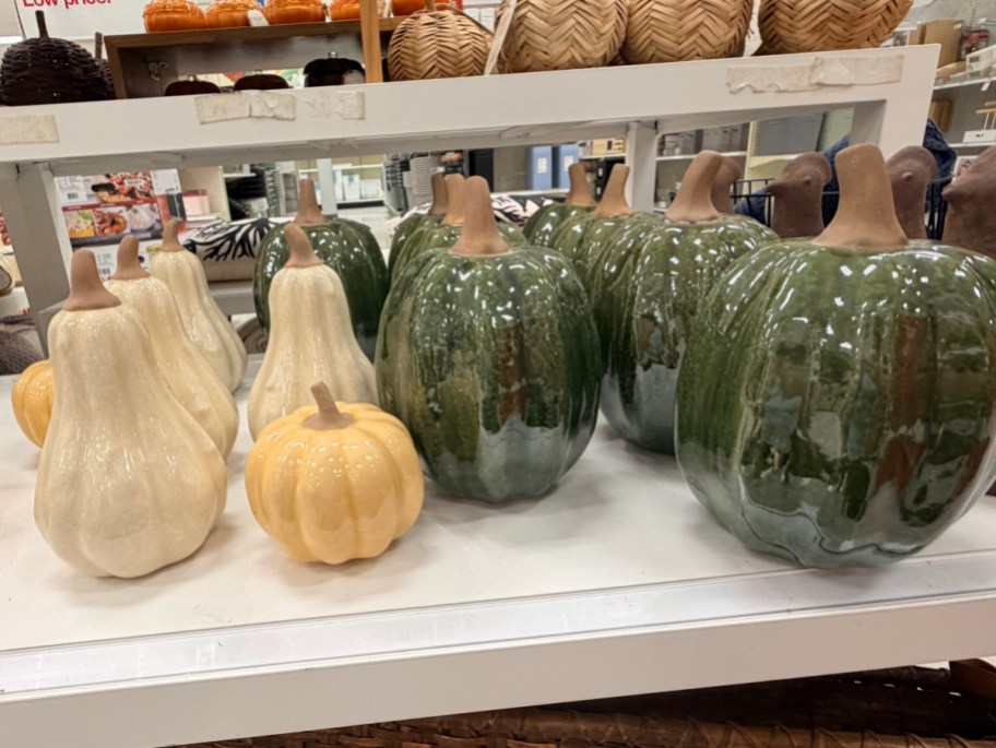 assorted ceramic pumpkins on shelf at Target