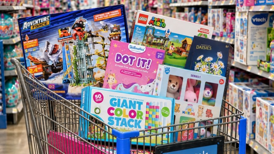 toys in a walmart cart on a store aisle