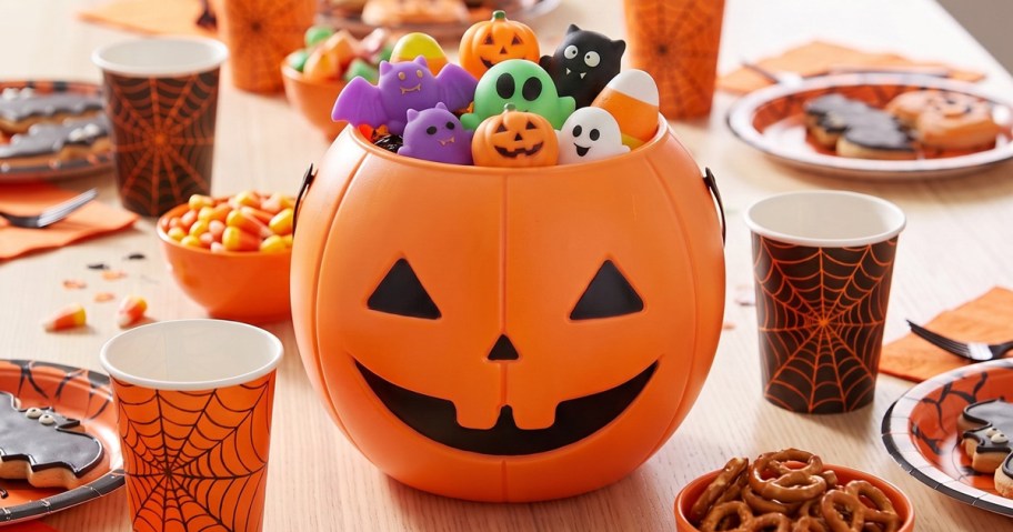 18 Halloween Squishy Party Favors in treat pail on a halloween party table