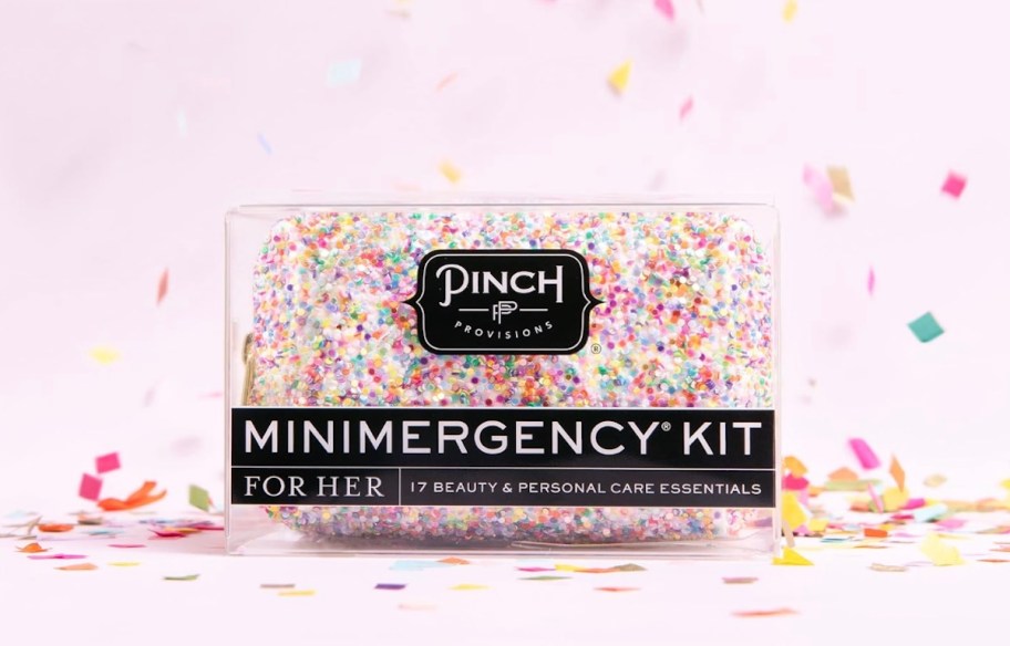 Minimergency Kit by Pinch Provisions on pink background with confetti