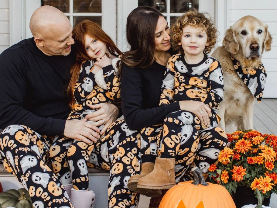 Family wearing Burts Bees Baby Halloween pajamas