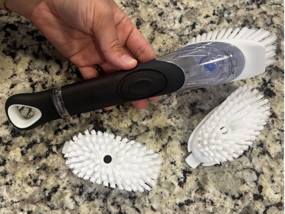 A Celox Dish Brush with two extra heads