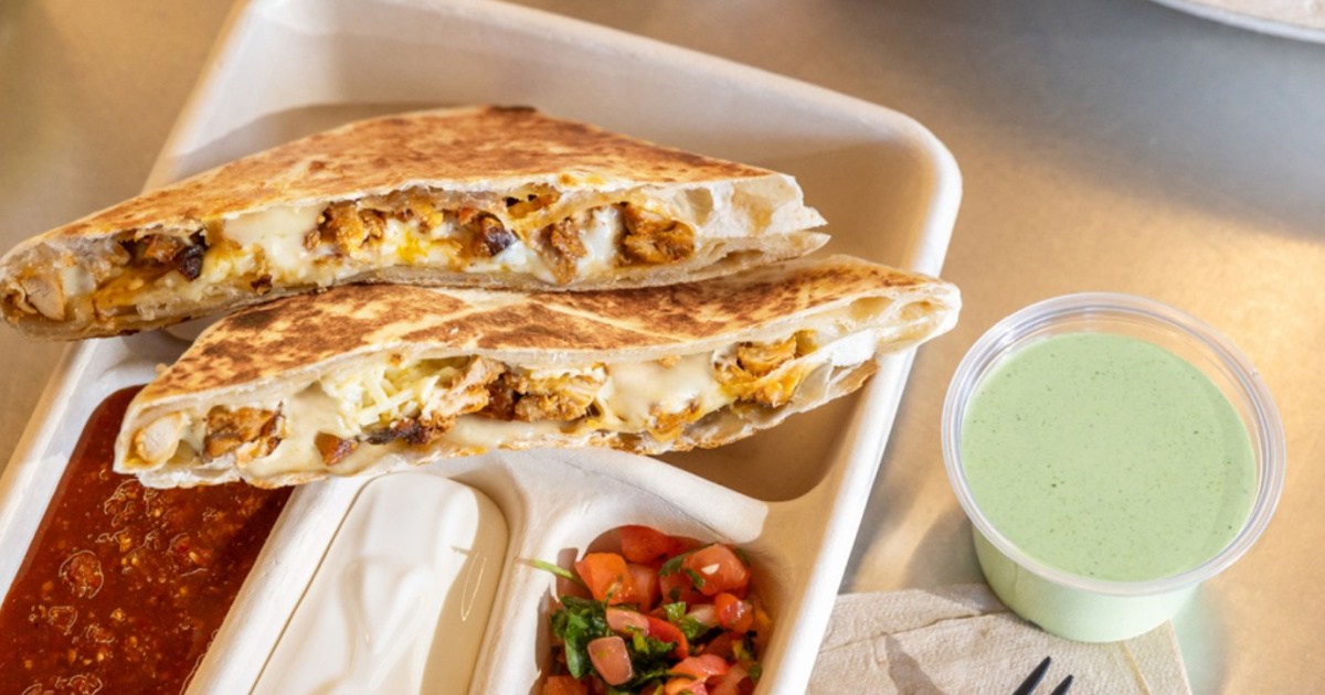 Chipotle, quesadilla in container with three different dipping sauces