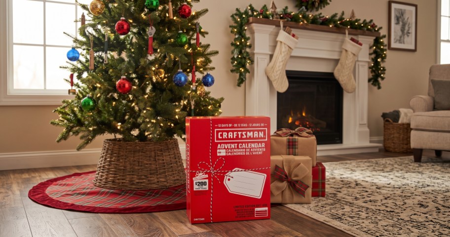 Red Craftsman 12 Days of Advent Calendar box in front of a decorated Christmas tree.