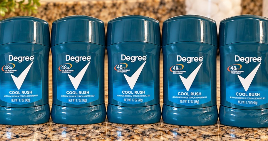 5 sticks of Degree Men's Deodorant in a row on a counter