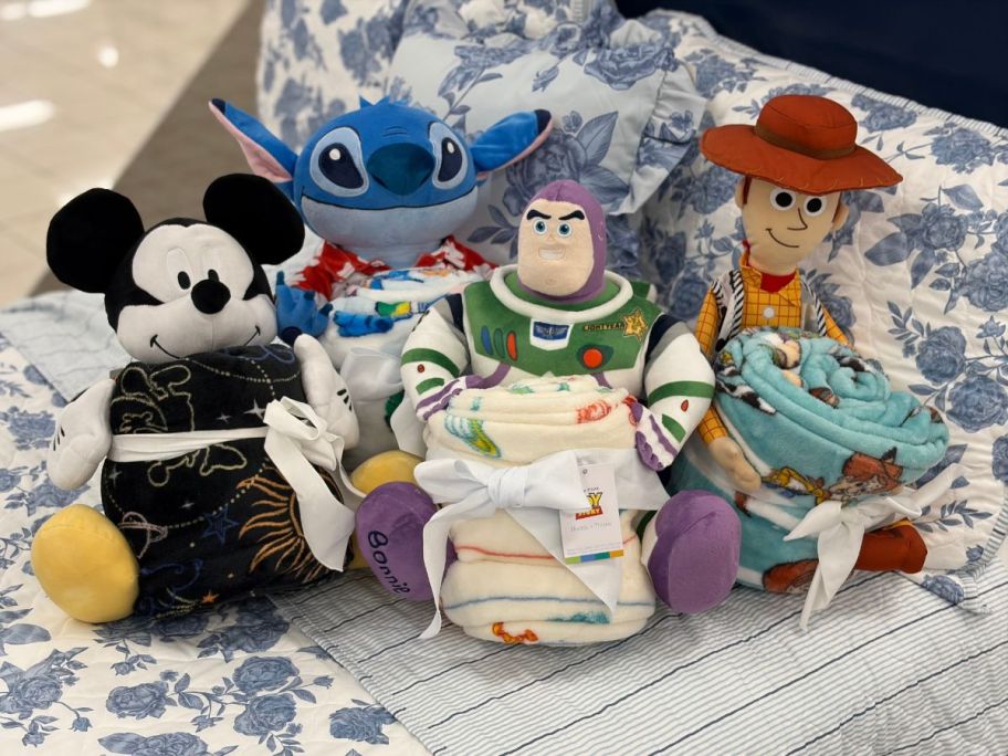 Disney x The Big One Buddy & Throws on bed in store