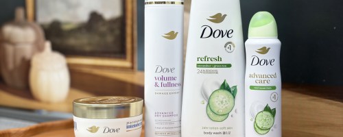 dove hair and body products on a scalloped tray
