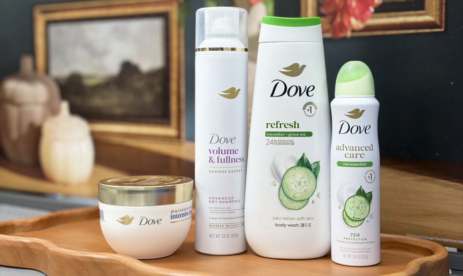dove hair and body products on a scalloped tray