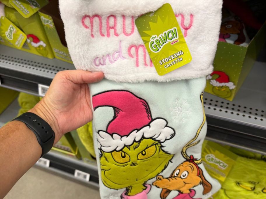 Dr. Seuss Grinch & Max 20" Christmas Stocking in hand in store