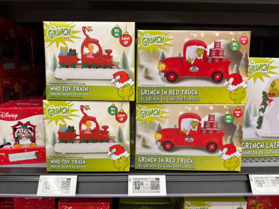 Dr. Seuss Grinch train and truck boxes on shelf in store