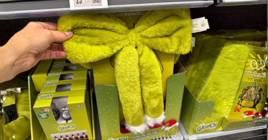 Dr. Seuss The Grinch Fuzzy Bow Hanging Decoration in hand in store