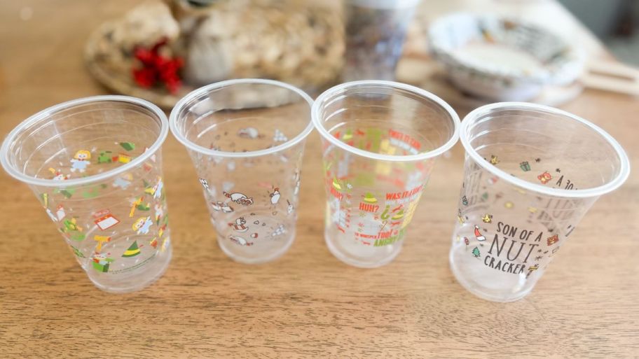 Four different elf design cups