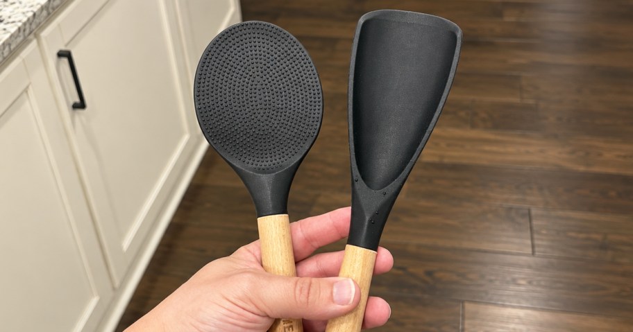 hand holding a set of silicone cooking utensils