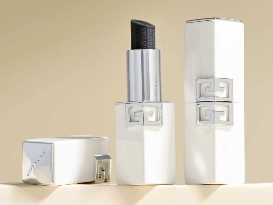 Givenchy Le Rouge Interdit Balm in a white and silver case with a black lipstick bullet.