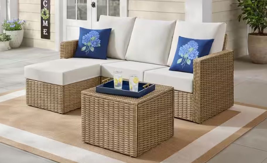 Hampton Bay Everlee 3-Piece Wicker Outdoor Sectional Set on a patio