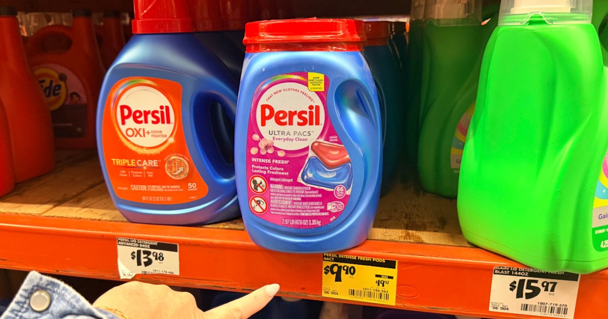 Hand pointing to persil laundry detergent on clearance at Home Depot store