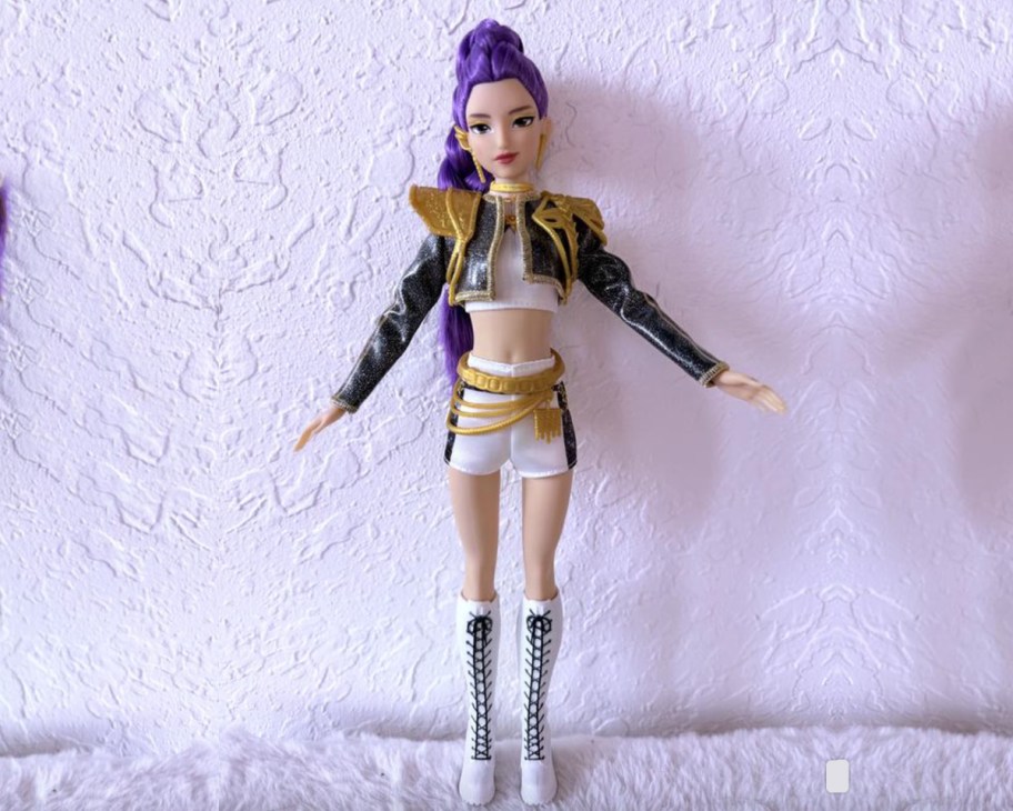 doll with purple hair and concert outfit