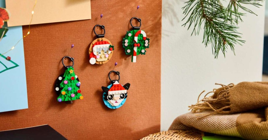 LEGO ornaments on a bulletin board in an office