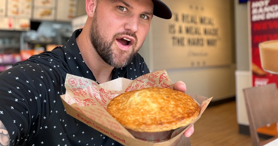 Man holding Pot Pie at KFC