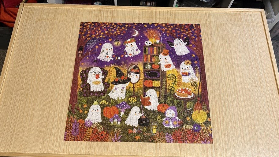 mudpuppy ghost puzzle on a puzzle table