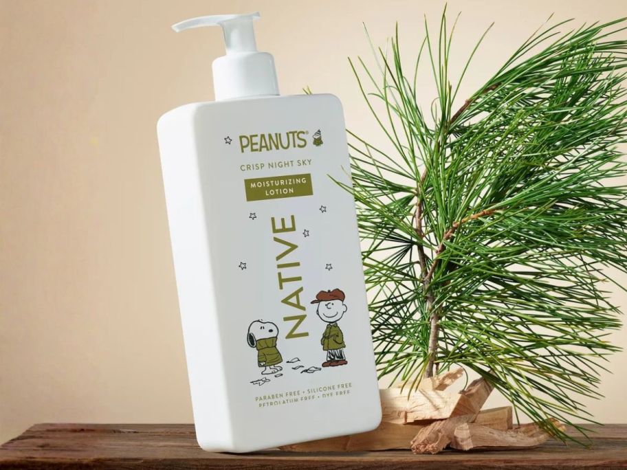 Native Fall Collab - Peanuts Body Lotion 16.5oz in Crisp Night Sky Scent on table