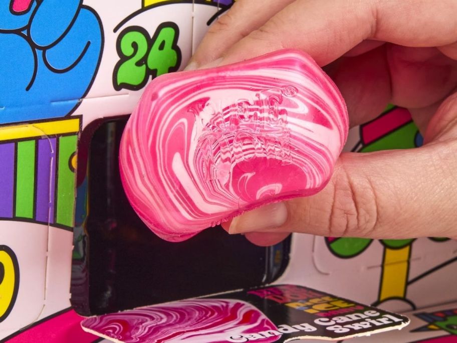 hand holding a squishy from a Needoh Advent Calendar