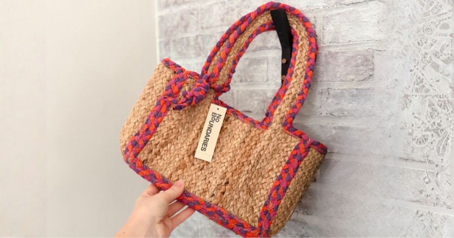 hand holding No Boundaries Women's Mini Jute Tote Bag