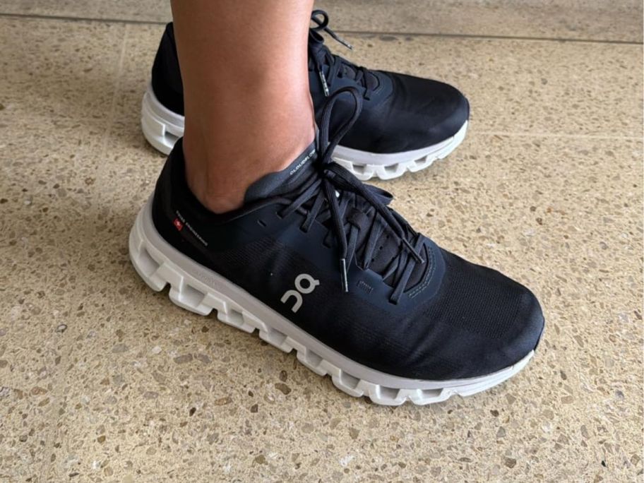 man wearing On Running Cloudflow 4 Men's Shoes