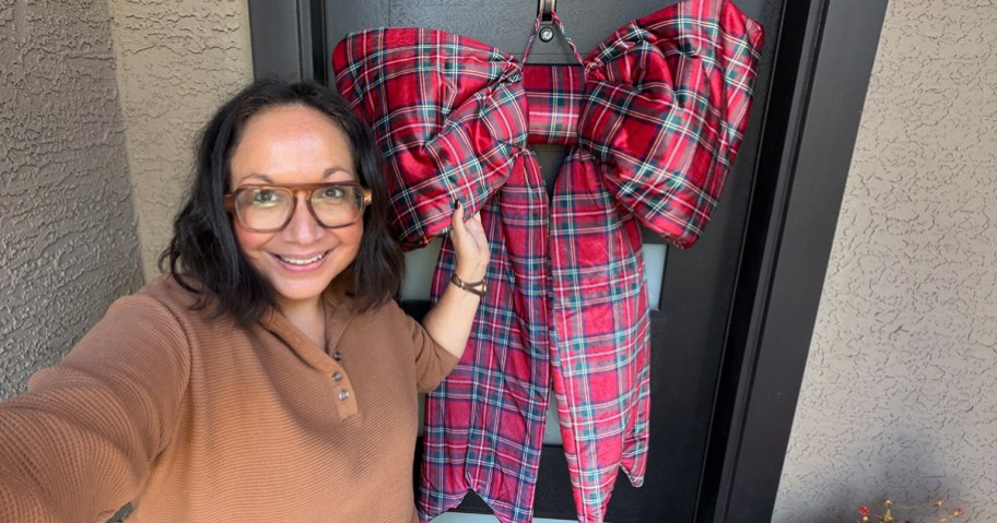 Oversized Bow from Sam's Club on a Door with smiling woman