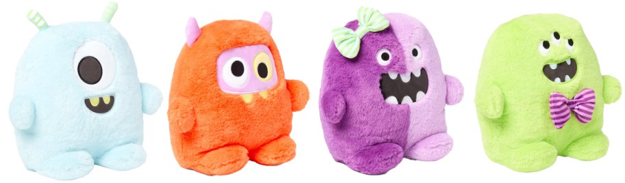 blue, orange, purple, and green monster plush pillows