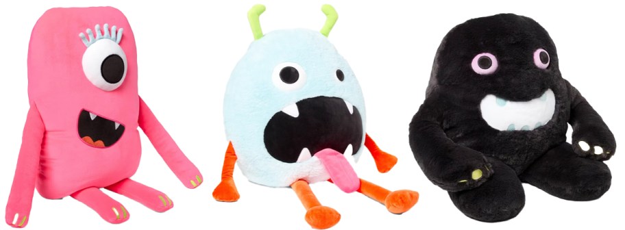 pink, blue, and black monster pillows