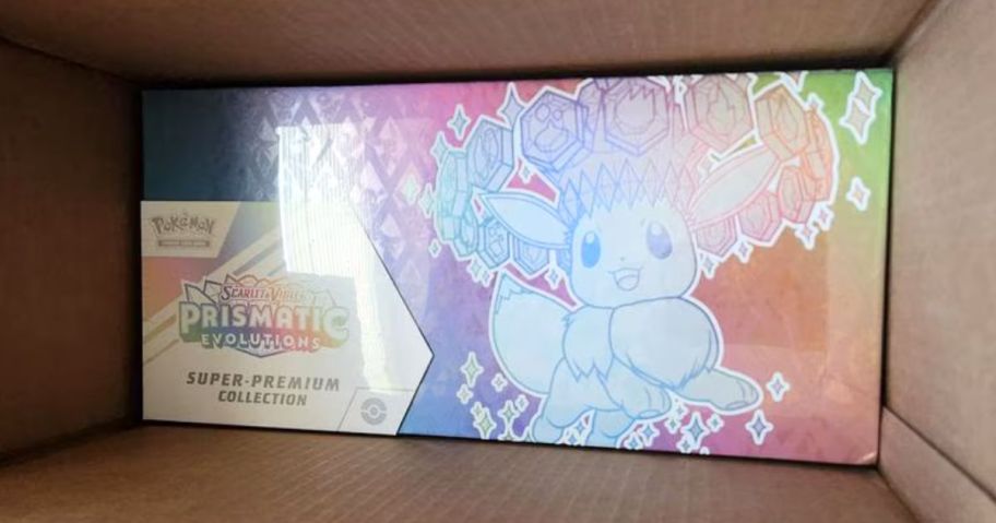 Pokemon Trading Card Game Prismatic Evolutions Super Premium Collection in delivery box