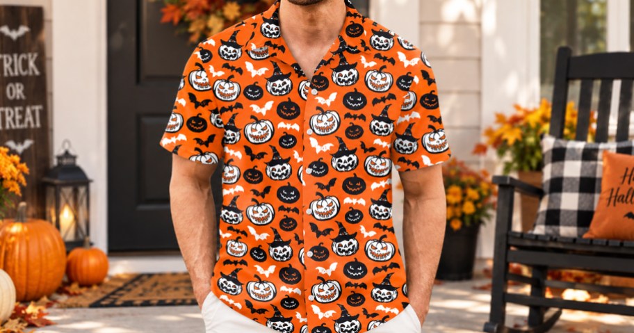 man wearing an orange pumpkin print hawaiian shirt