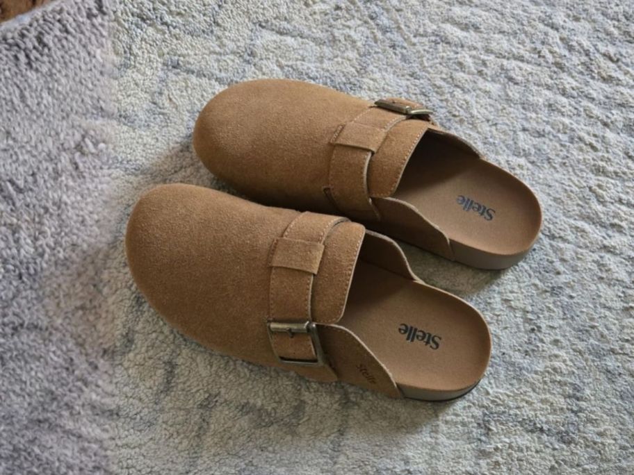 Stelle Suede Clogs on rug