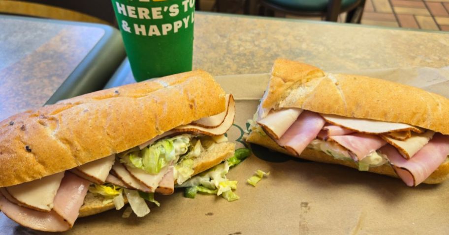 A Subway Footlong sandwich and drink
