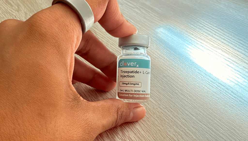 Holding Terzepatide bottle 