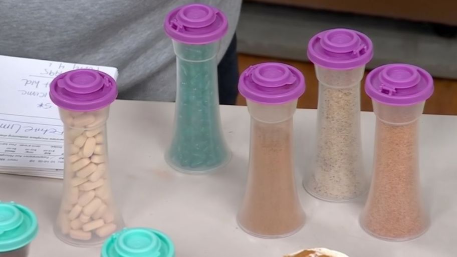 Tupperware shakers displayed on top of the table