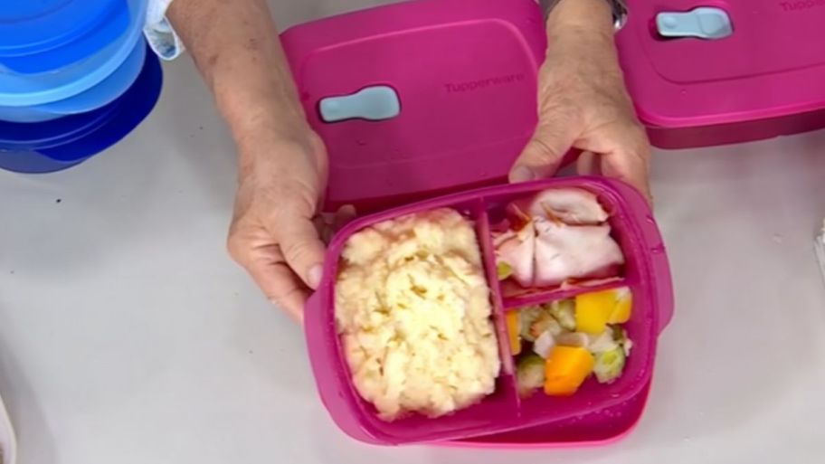Tupperware two piece opened with food inside