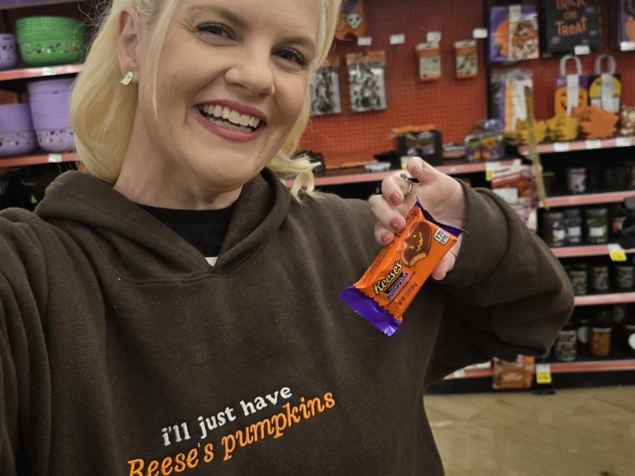 Woman with reeses pumpkin