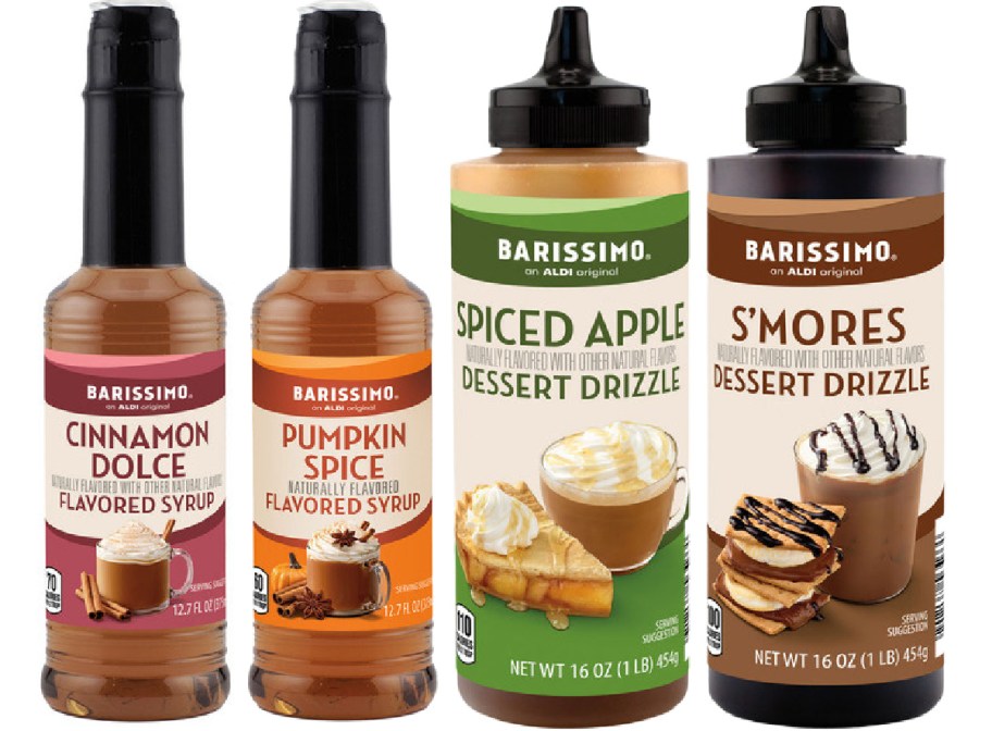 Four bottles of Barissimo coffee syrups and dessert drizzles displayed side by side, featuring Cinnamon Dolce, Pumpkin Spice, Spiced Apple, and S'mores flavors.